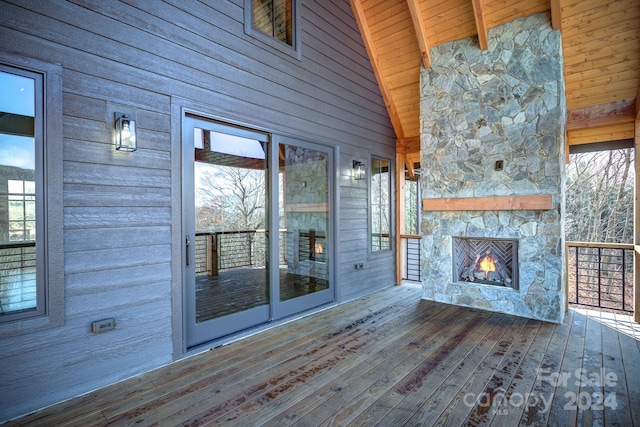 exterior space with an outdoor stone fireplace