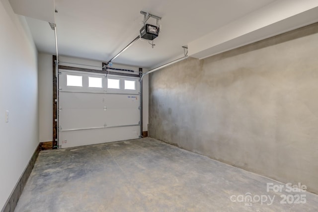 garage featuring a garage door opener