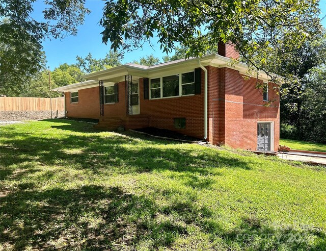 exterior space with a yard