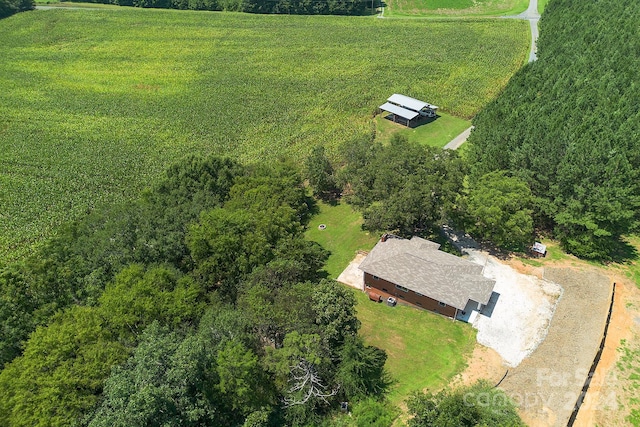 birds eye view of property with a rural view