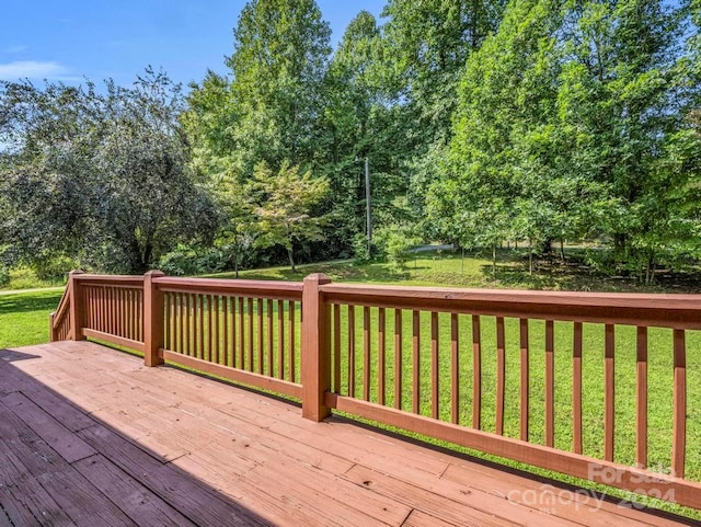 deck featuring a yard