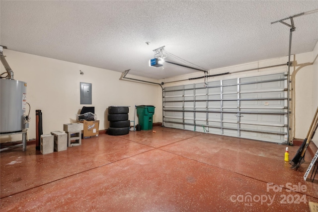 garage featuring gas water heater, electric panel, and a garage door opener