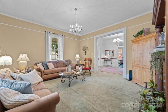 living room with crown molding, carpet floors, and a notable chandelier