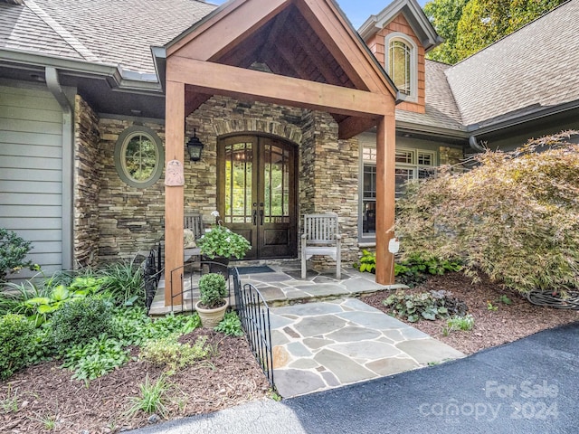 doorway to property with french doors