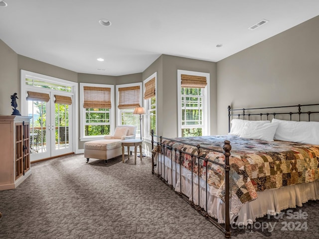 bedroom with access to exterior, carpet flooring, and french doors