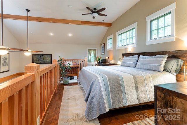 bedroom featuring vaulted ceiling with beams, a ceiling fan, and wood finished floors