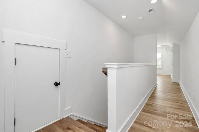 hall with light wood-type flooring