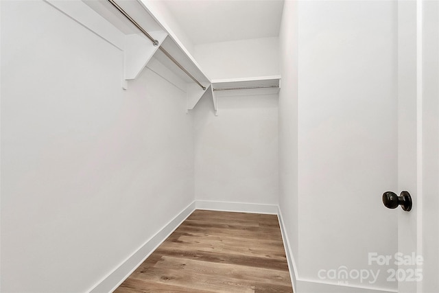 3230 Rogers St, Charlotte, NC 28208 - spacious closet featuring wood finished floors