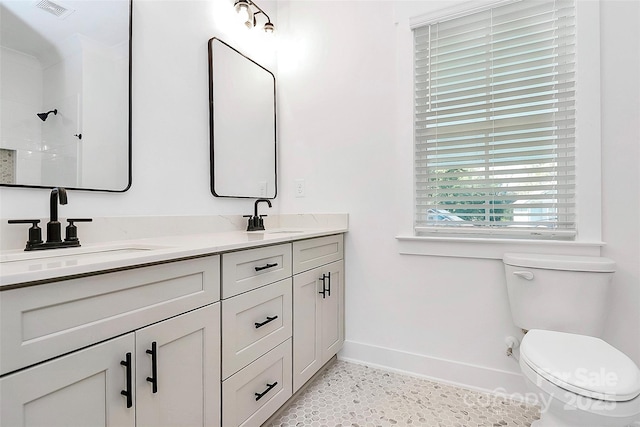 3230 Rogers St, Charlotte, NC 28208 - full bath with toilet, a sink, double vanity, and walk in shower