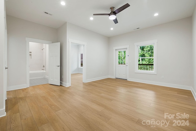 interior space with light hardwood / wood-style floors and ceiling fan