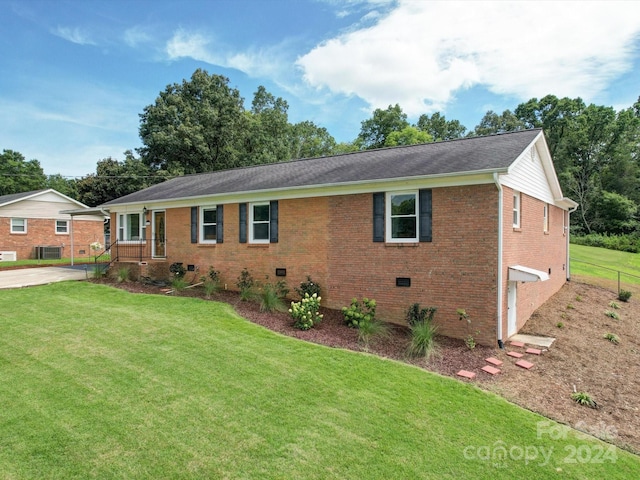 ranch-style house featuring crawl space, a front yard, and brick siding