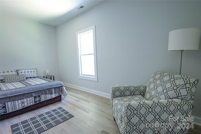 bedroom with light wood-type flooring