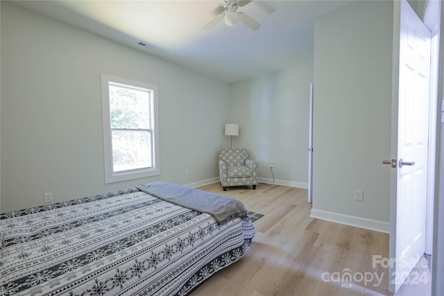 bedroom with light hardwood / wood-style flooring