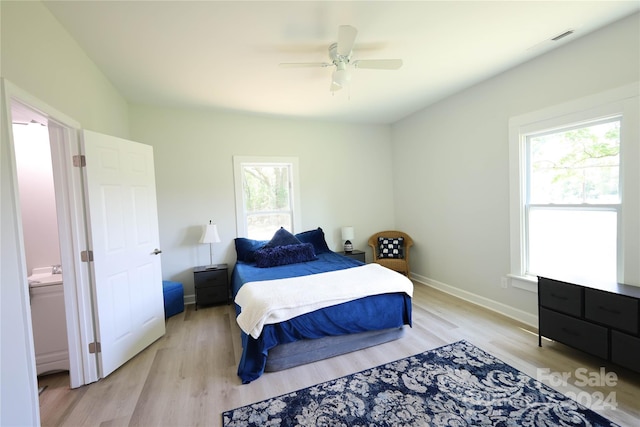 bedroom featuring ceiling fan and light hardwood / wood-style flooring