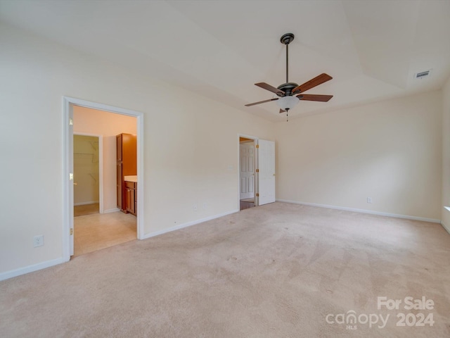 tiled empty room featuring ceiling fan