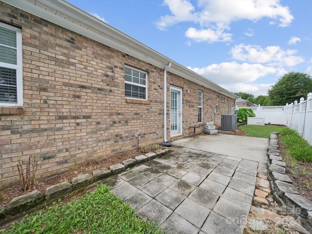 view of patio with central AC unit