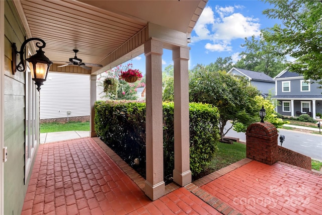 view of patio featuring ceiling fan