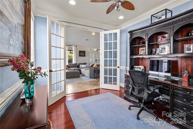 home office with crown molding, french doors, ceiling fan, and hardwood / wood-style flooring