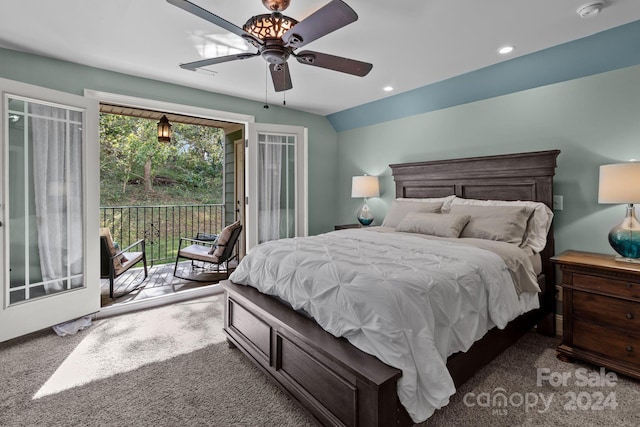 carpeted bedroom featuring ceiling fan, lofted ceiling, and access to exterior