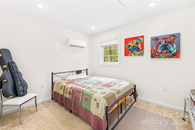 carpeted bedroom with an AC wall unit