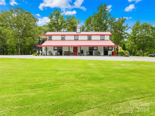 view of front of property with a front lawn and a porch