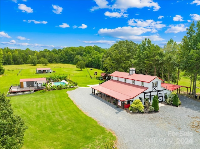 birds eye view of property featuring a rural view