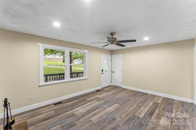 spare room with ceiling fan and hardwood / wood-style floors