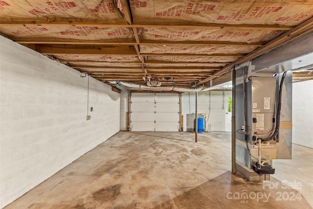 garage featuring heating unit