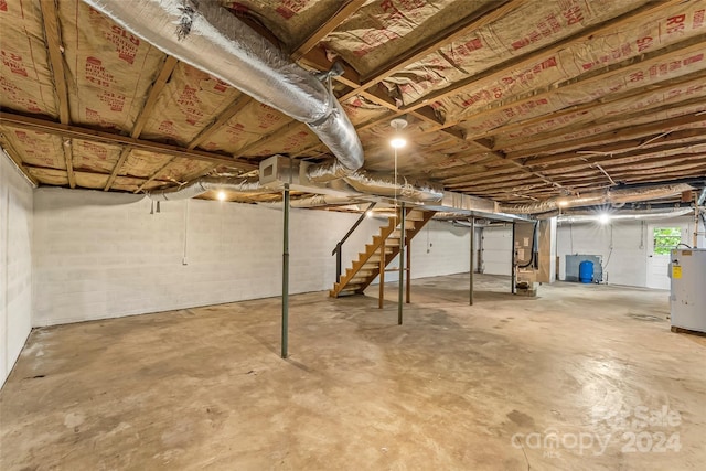 basement featuring electric water heater