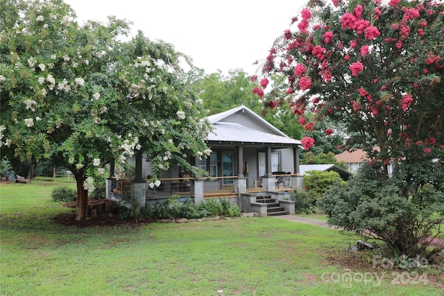 exterior space with a front lawn