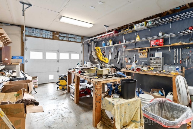 garage with a workshop area