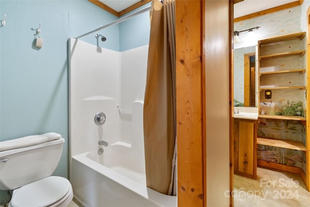 full bathroom featuring shower / tub combo with curtain, vanity, and toilet