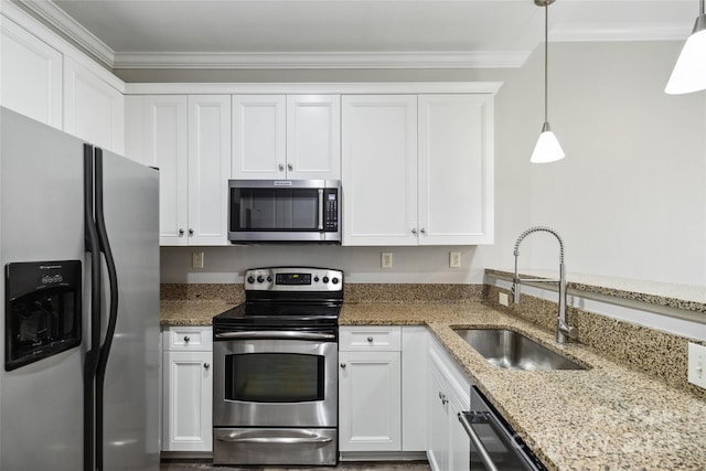 kitchen with white cabinets, stone counters, decorative light fixtures, and appliances with stainless steel finishes