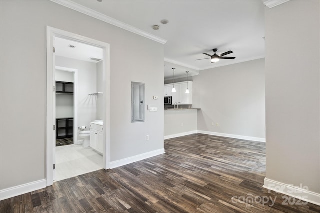 unfurnished living room with ceiling fan, ornamental molding, dark wood-type flooring, and electric panel