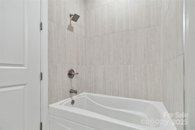 bathroom featuring shower / tub combination