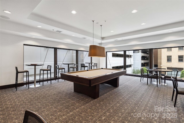 playroom featuring a raised ceiling, dark colored carpet, and pool table