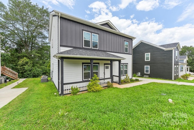 view of front of property with a front lawn