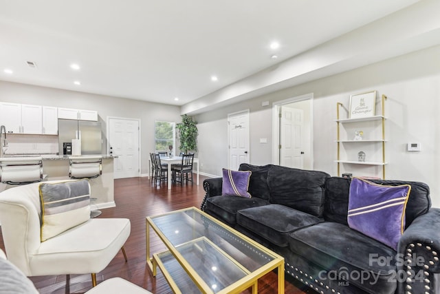 living room featuring dark hardwood / wood-style floors