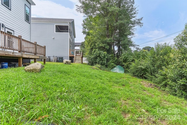 view of yard featuring a deck