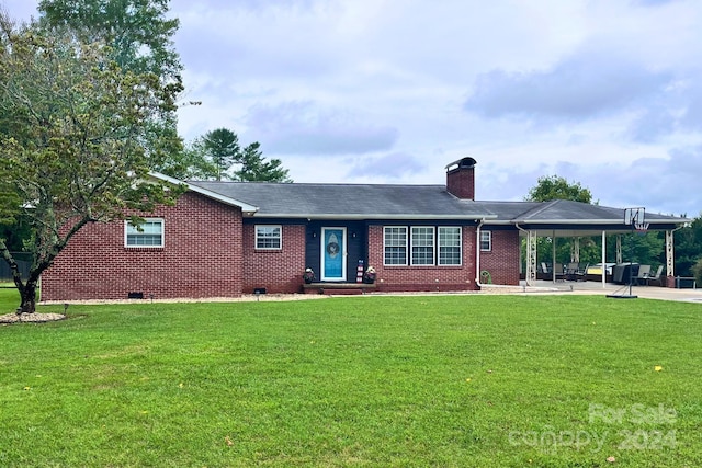 single story home featuring a patio area and a front lawn