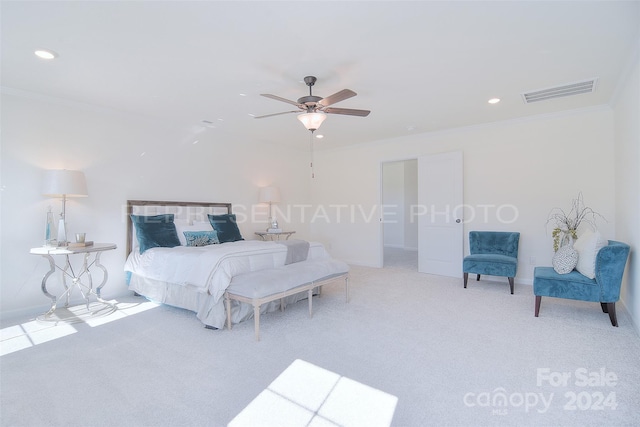 bedroom with light carpet, ceiling fan, and crown molding