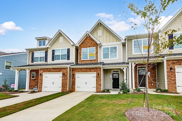 view of front facade featuring a front yard and a garage