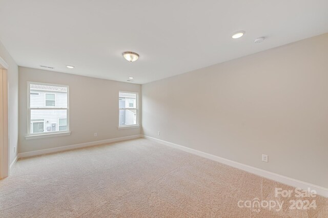 view of carpeted spare room