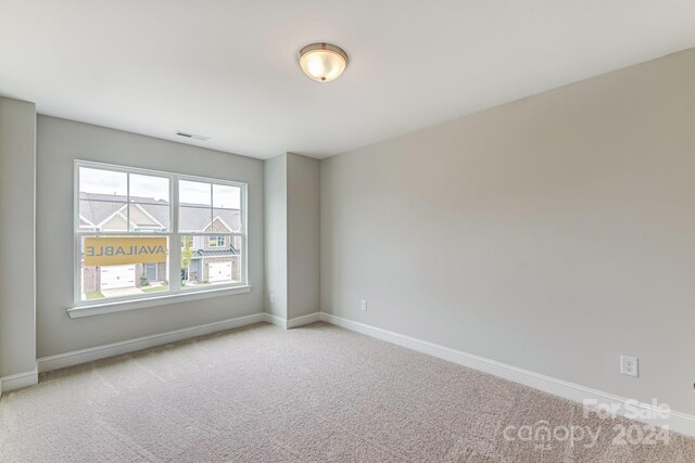 view of carpeted spare room