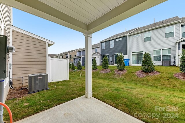 view of yard featuring central AC