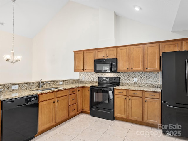 kitchen with sink, high vaulted ceiling, decorative light fixtures, light tile patterned flooring, and black appliances