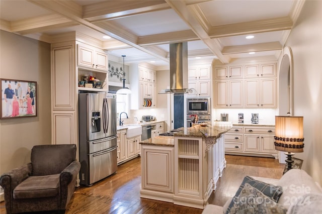 kitchen featuring stainless steel appliances, light wood-type flooring, a center island, coffered ceiling, and light stone countertops