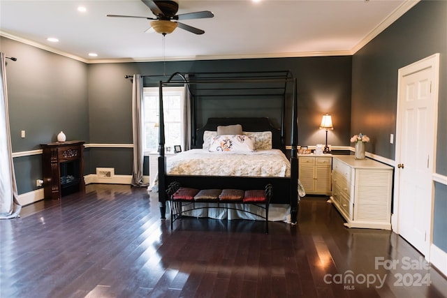 bedroom featuring ornamental molding, ceiling fan, and dark wood-type flooring