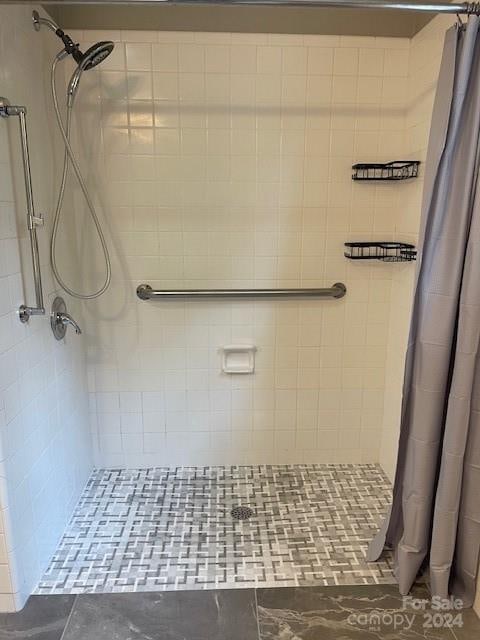 bathroom with a shower with curtain