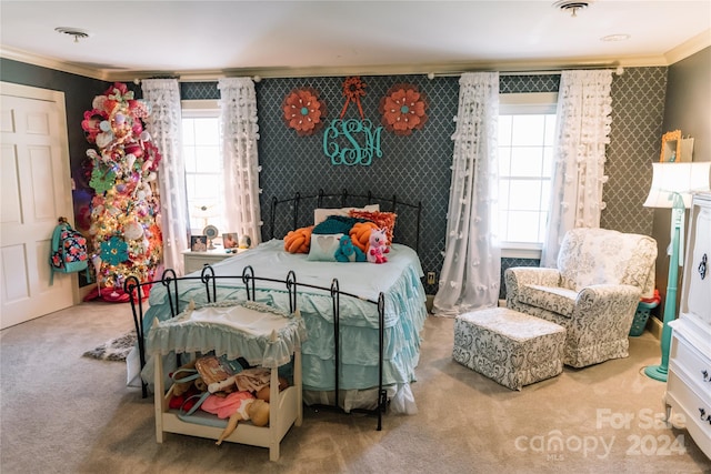 carpeted bedroom with multiple windows and crown molding